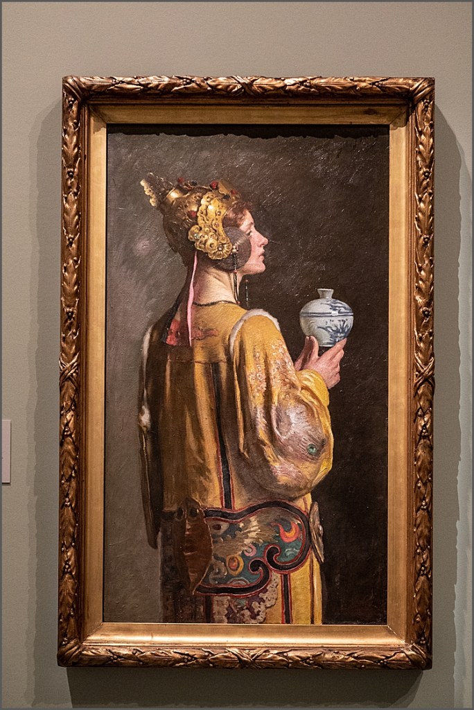 Painting of a woman holding vase in The National Gallery Victoria.